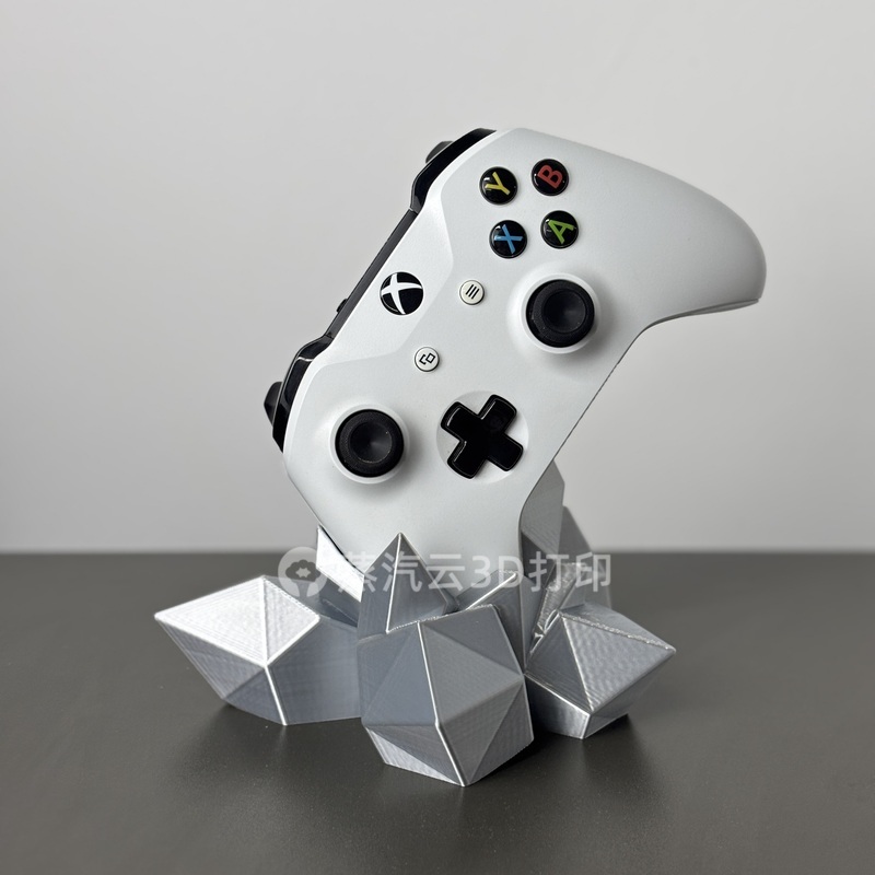حامل وحدة تحكم الألعاب العالمي - مراجعة 3D Printing Xbox Controller وسعره